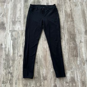 Calvin Klein, button up black jegging size 4 .. cut out tag for comfort